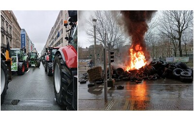 assedio degli agricoltori con centinaia di trattori alle sedi ue a bruxelles roghi e petardi