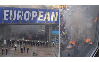 protesta agricoltori a bruxelles sale la tensione davanti all europarlamento lancio di bottiglie e statue abbattute video