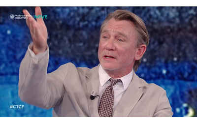Daniel Craig e lo spot con Elisabetta II: “Quando Danny Boyle mi disse l’idea gli risi in faccia. La Regina? Ha anche improvvisato”