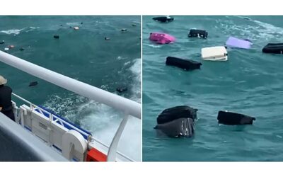 I passeggeri del traghetto vedono all improvviso i propri bagagli galleggiare in mare e scatta il panico il video virale