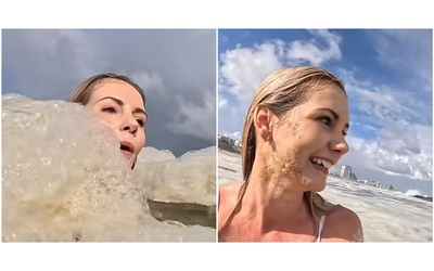 “È salata”, ma non è schiuma di mare: influencer nuota felice e sorridente tra i liquami