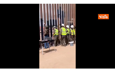 Trump ordina di verniciare di nero il muro tra Usa e Messico per renderlo incandescente. E la “sua” segretaria fa il video durante i lavori